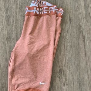Nike Woman’s orange leggings - XS